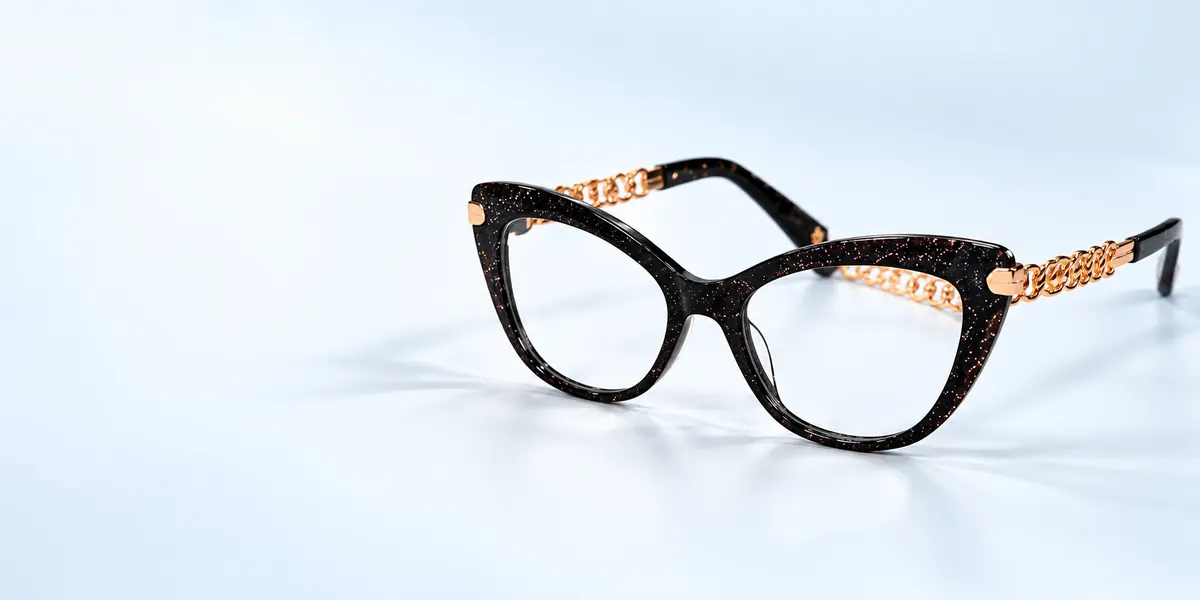 Occhiali da vista cat-eye neri con la catenella dorata